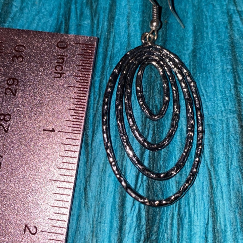 Silver costume jewelry earrings